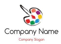 A colorful artist paint palette with a paintbrush.