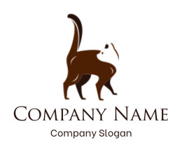 Silhouette of a brown cat standing with an arched back and raised tail.