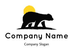 Silhouette of a bear with a yellow sun in the background.