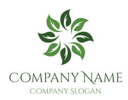 A circular pattern made of green leaves in alternating shades.